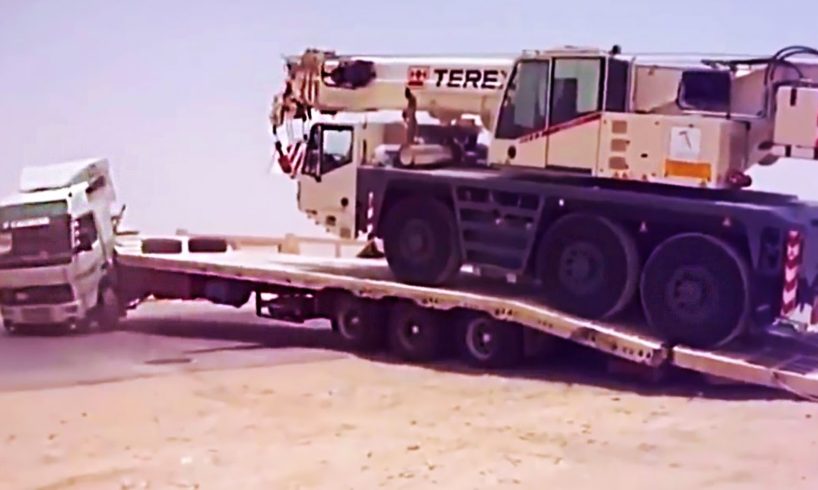 Failed loading and unloading of heavy equipment. Falling from a trailer of heavy equipment.