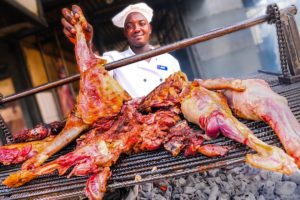 Kenyan MEAT TOUR in Nairobi!!! BOILED COW HEAD & Nyama Choma!!!