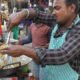 Energetic Man Selling Chinese Food in Lucknow - Veg Noodles / Momo @ 20 rs Plate