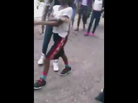 Hood mama pulls out gun and starts firing shots during hood fight