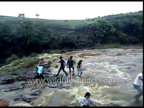 Waterfall incident in India sweeps family into the water
