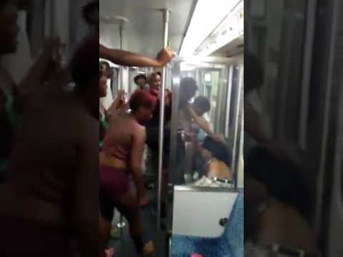 Hood fight guy get jumped on train