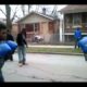 Hood fight with boxing gloves.
