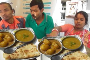 Dynamic Hard Working Husband Wife Working Together - 2 Paratha with Aloo Dum & Ghugni Curry @ 20 rs