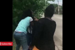 Girls fight in the street