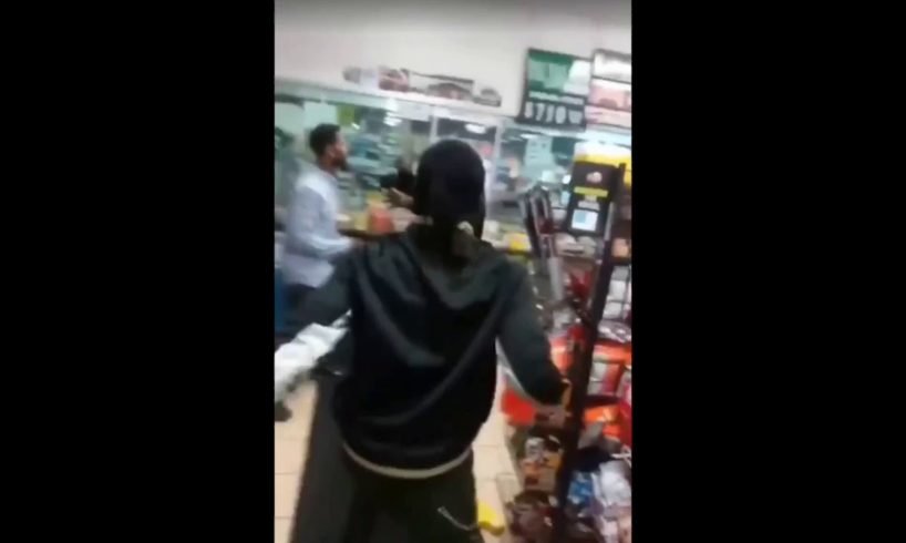 Hood fight in Milwaukee gas station