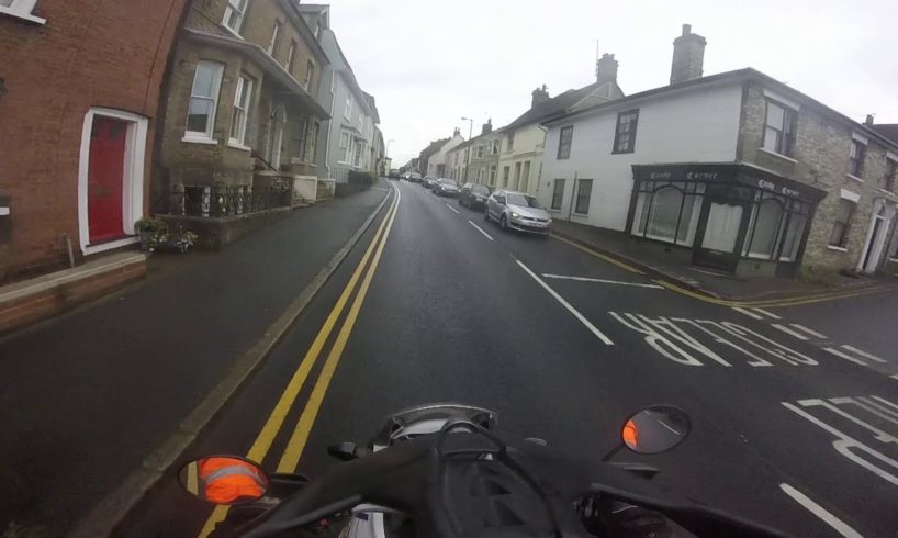 Near miss, car pulls out on biker