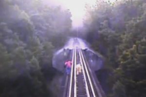 Close Call: Two women narrowly escape death on railroad tracks