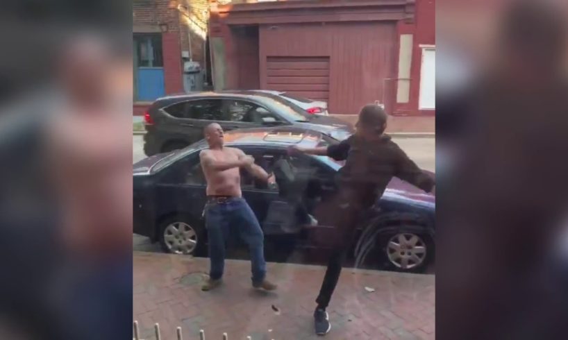 EPIC spinning heel kick as skinny guy wins street fight