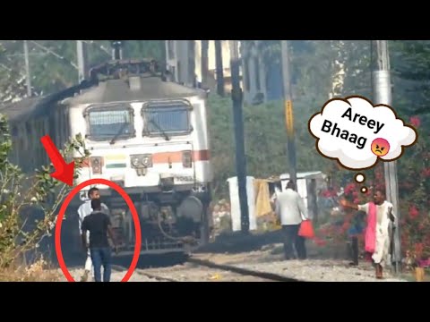 IDIOT Man Almost HIT By SUPERFAST TRAIN ?? | train accident india 2021 | the mix box