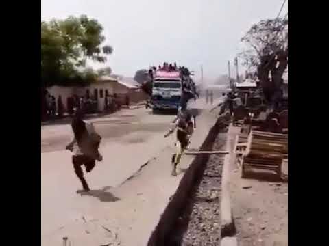 crazy driving skill, with a lorry full of people , near death experience reckless but great skill