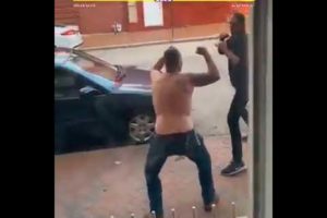 two tall men fight over bull shit. hood fights