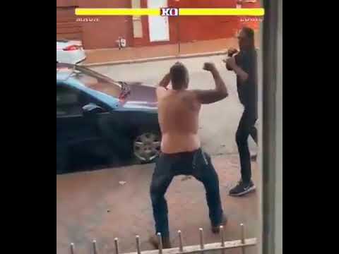 two tall men fight over bull shit. hood fights