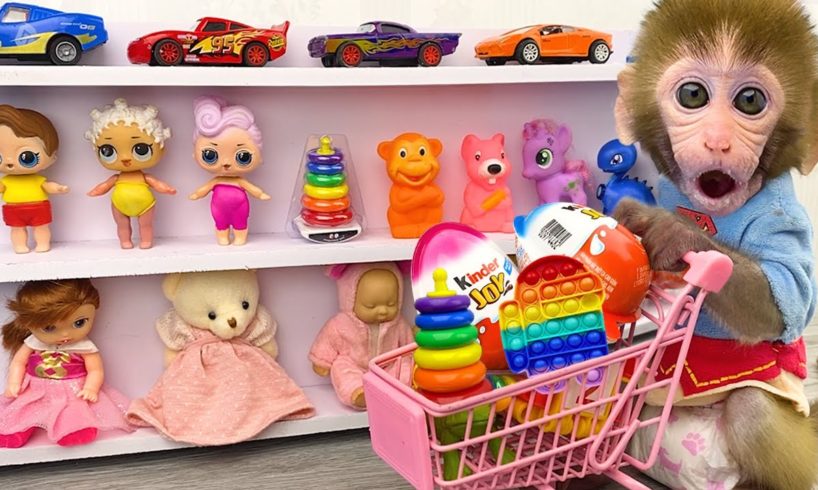 Monkey Baby Bon Bon doing shopping in doll store and eat Kinder Joy Egg chocolate with puppy