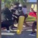 Woman arrested for her alleged role in a school fight