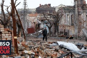 Russian forces pick through the remains of destroyed Ukrainian towns