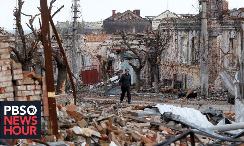 Russian forces pick through the remains of destroyed Ukrainian towns