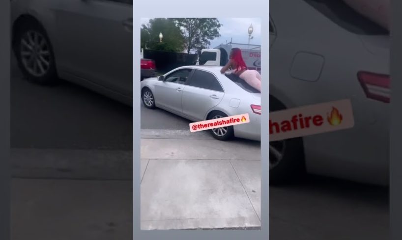 Crazy girlfriend jumps on car for phone (hood fight)