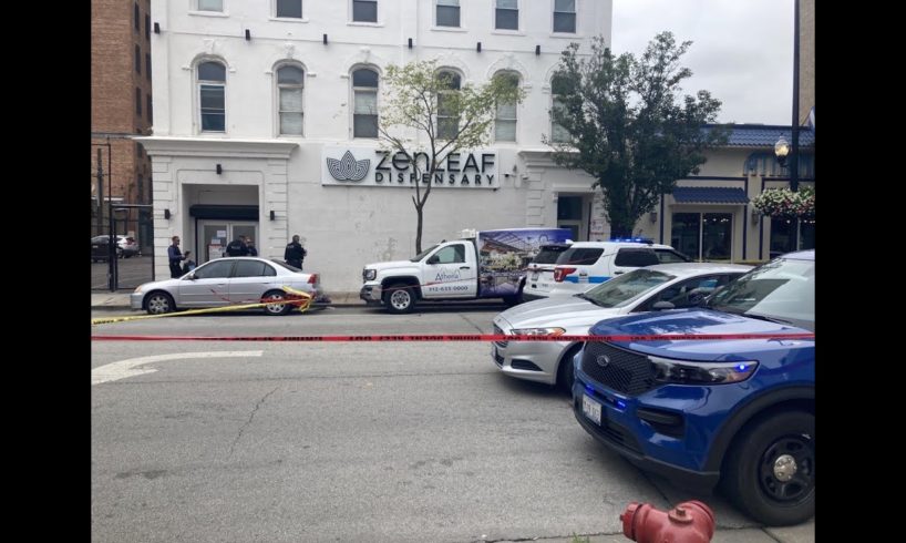 Axe-wielding man shot and killed after attacking security guard in Greektown