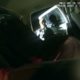 Camera footage shows train hitting Colorado police car with woman handcuffed inside vehicle