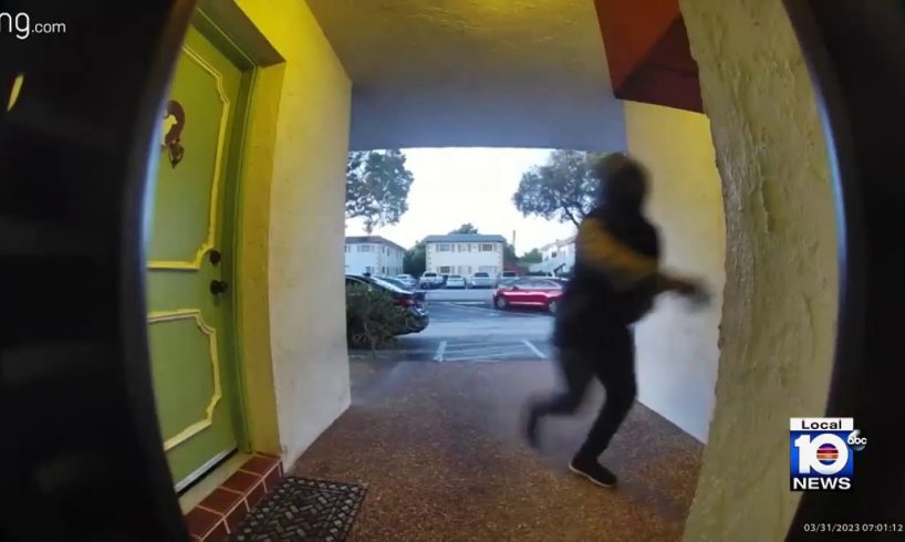 Man caught on camera forcing way into woman's home in Sunrise