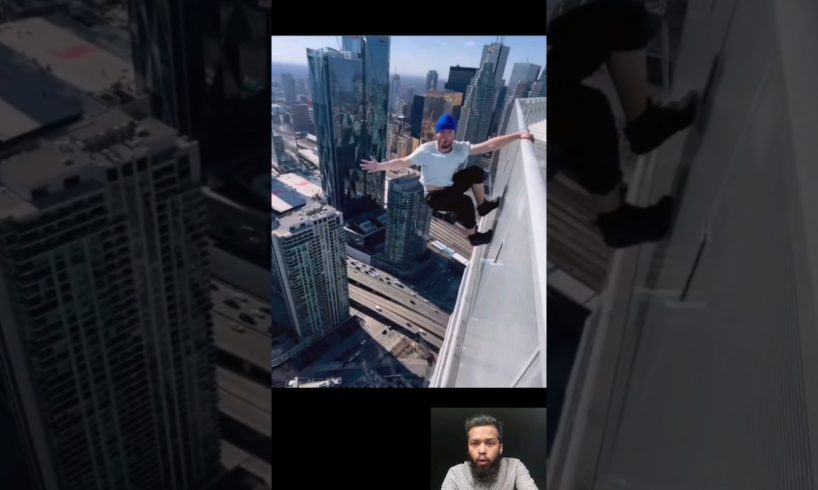 This man is hanging top of the building😲🔥💯 #um4glad #shorts #short #trending #respect @Um4glad1