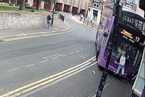 Double decker bus hits man in Reading