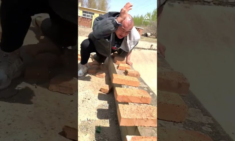 Man Breaking Bricks With Bare Hands | People Are Awesome