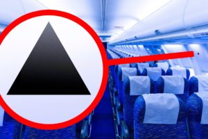 What a Tiny Triangle Above Your Plane Seat Means