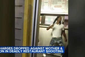 Video shows man punching woman before her son shoots him