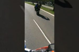 🔥 Biker does a wheelie past me