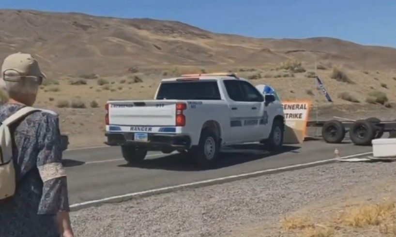 How Nevada Police 'dealt with' climate protesters blocking road to Burning Man Festival