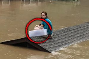 Teen Girl and Her Dog Rescued from Flooded Rooftop