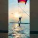 Woman Hangs Upside Down From Parasailer | People Are Awesome