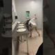 2 girls fighting in the bathroom