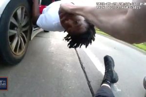 Bodycam: Getaway Driver Drags Cop After Teen Suspect Hops in Back Seat During Foot Chase