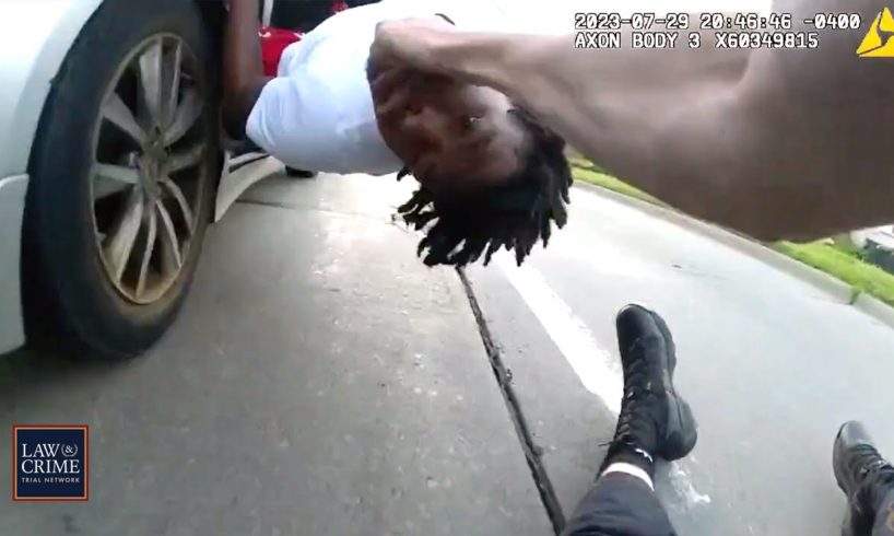 Bodycam: Getaway Driver Drags Cop After Teen Suspect Hops in Back Seat During Foot Chase