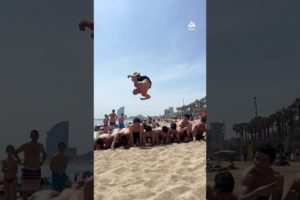 Guy Executes Side Flip Over Multiple People at Beach | People Are Awesome
