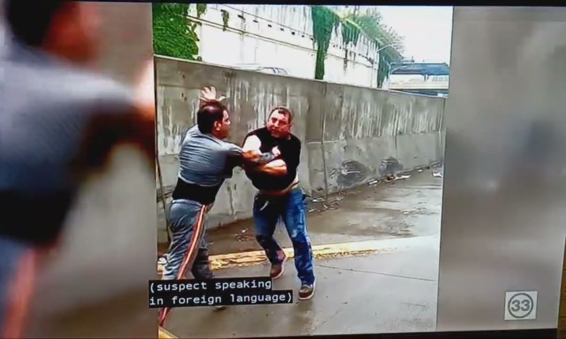 Two police officers rush to break up a street fight between two taxi drivers. #fight #fighting #wow