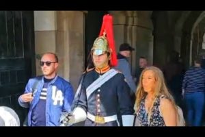 YOU'RE TOO CLOSE! King's Guard gives tourist his signature death stare at Horse Guards!