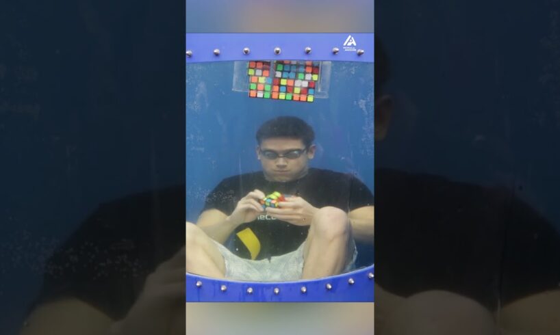Guy Solves 8 Rubik's Cubes Underwater | People Are Awesome