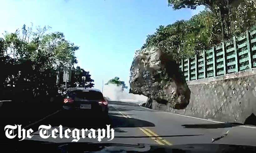 Moment boulder strikes car during Taiwan earthquake