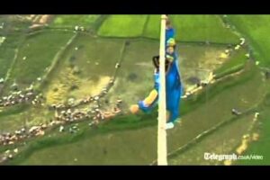 Acrobat falls off tight-rope in death defying high wire stunt gone wrong