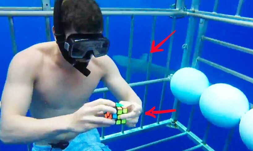 Clock Vs. Sharks: Man Solves Rubik's Cube Underwater & More | GOALS