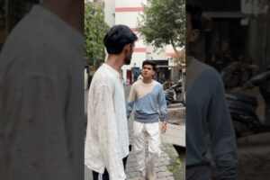 Men showing attitude in a street fight