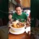 Food blogger mark wiens eating the most well known food, Cansi in bacolod. Erons Cansi House.