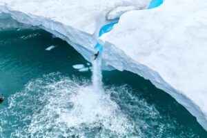 Kayaking down the ICE WALL (extreme Arctic waterfall)