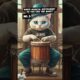 a cat playing a musical instrument.#animals #aboutanimals